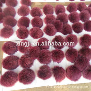 Genuine fox fur pom poms